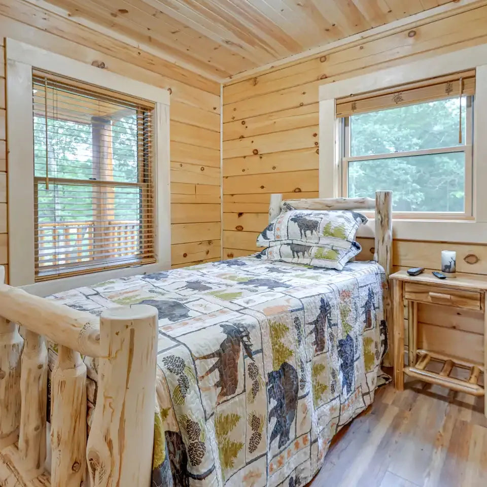 Log bed in cabin for rent in adams wisconsin